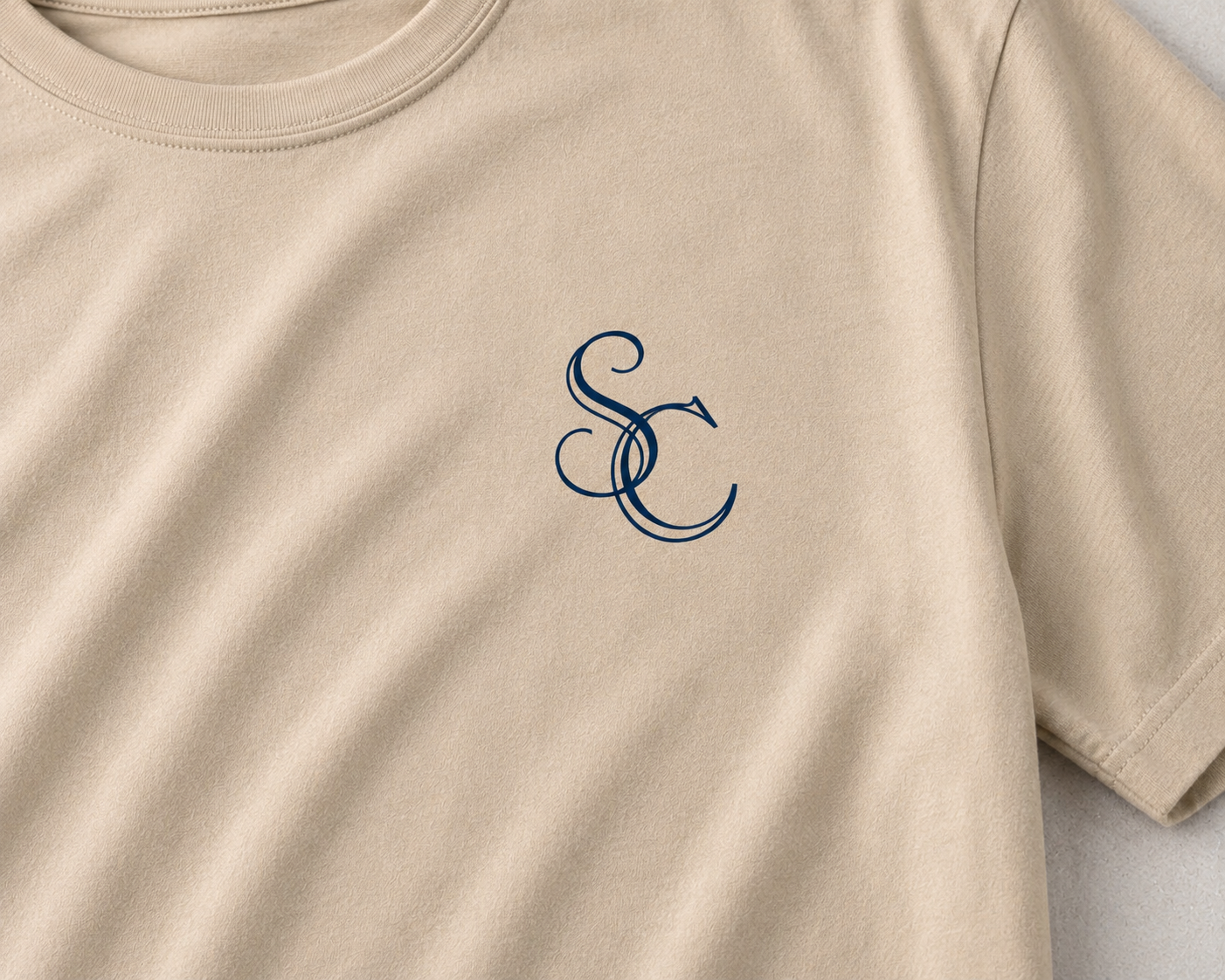 Savannah Cadence left chest logo embroidered-style print on the Driftwood Tee